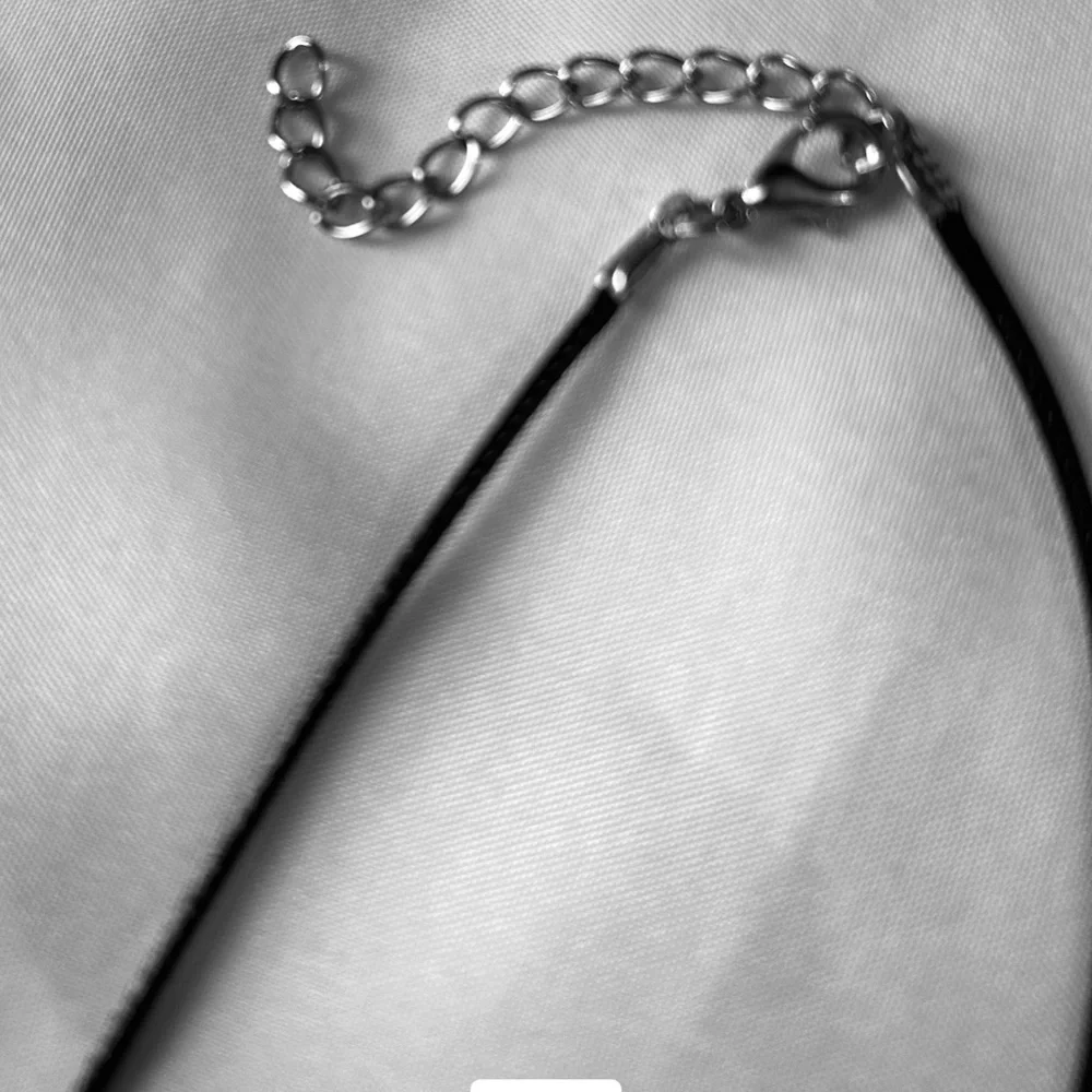 Shark Tooth Pendant With Black Cord Necklace